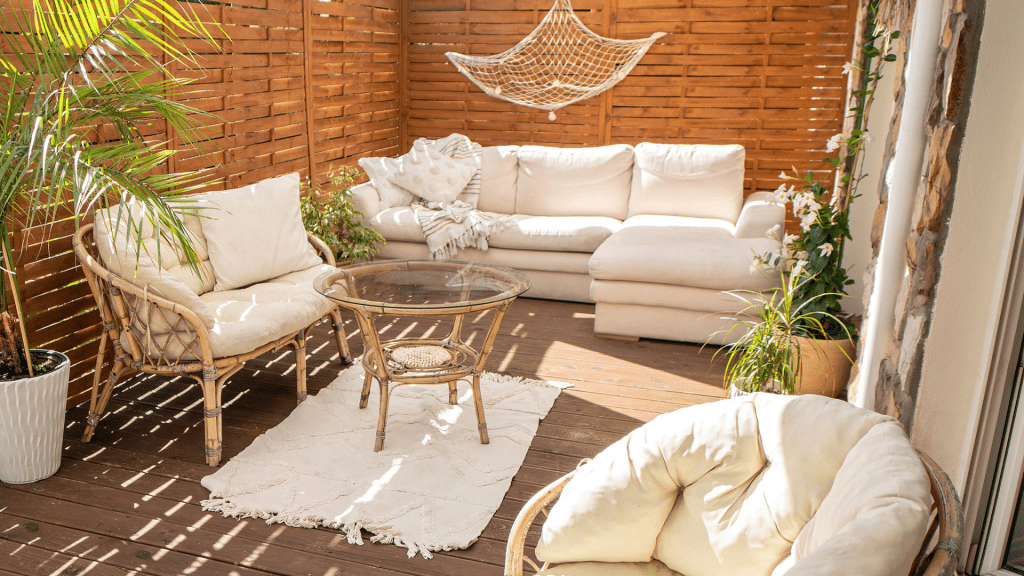 Outdoor living room with soft furnishings, pillows and rugs